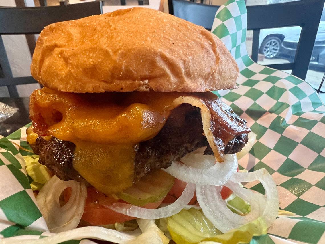 The Original Chop House Burger, seen Jan. 15, 2022, remains the same: a bacon-cheddarburger with a brisket blend and steak sauce. Bud Kennedy/bud@star-telegram.com
