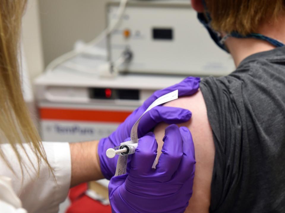coronavirus vaccine trial injection shot patient covid 19