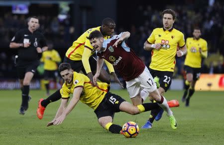 Britain Football Soccer - Watford v Burnley - Premier League - Vicarage Road - 4/2/17 Burnley's Robbie Brady in action with Watford's Craig Cathcart Reuters / Darren Staples Livepic