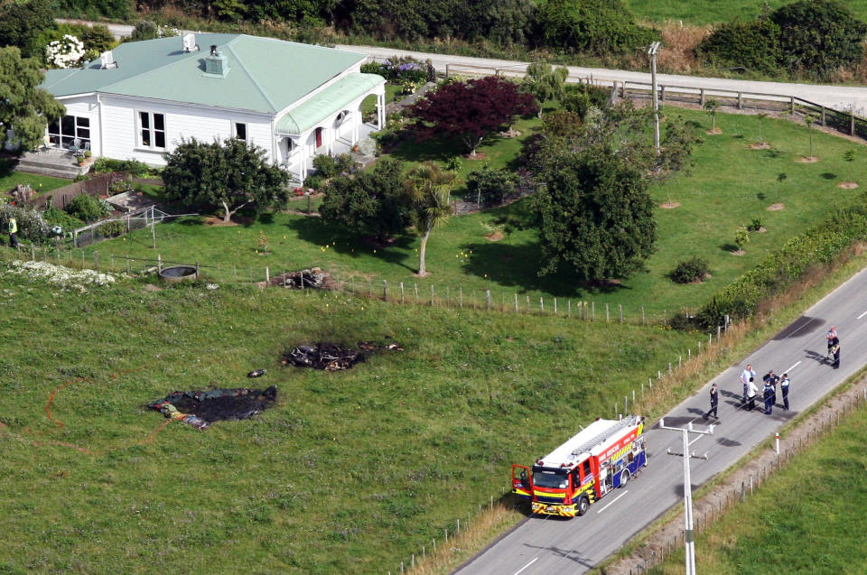 FILE - This Jan. 7, 2012 file aerial photo, shows the burned areas where a hot air balloon crashed after it caught on fire in Carterton, New Zealand. The hot air balloon struck power lines and exploded, crashing to the ground and killing all 11 people on board. (AP Photo/Wairarapa Times, Lynda Feringa, File)