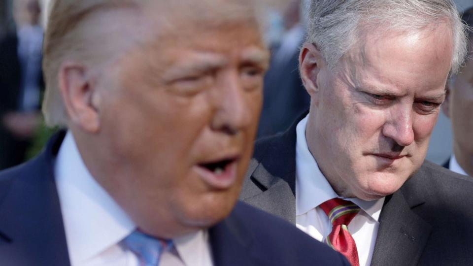 PHOTO: President Donald Trump speaks as White House Chief of Staff Mark Meadows listens prior to departure from the South Lawn of the White House, July 29, 2020. (Alex Wong/Getty Images, FILE)