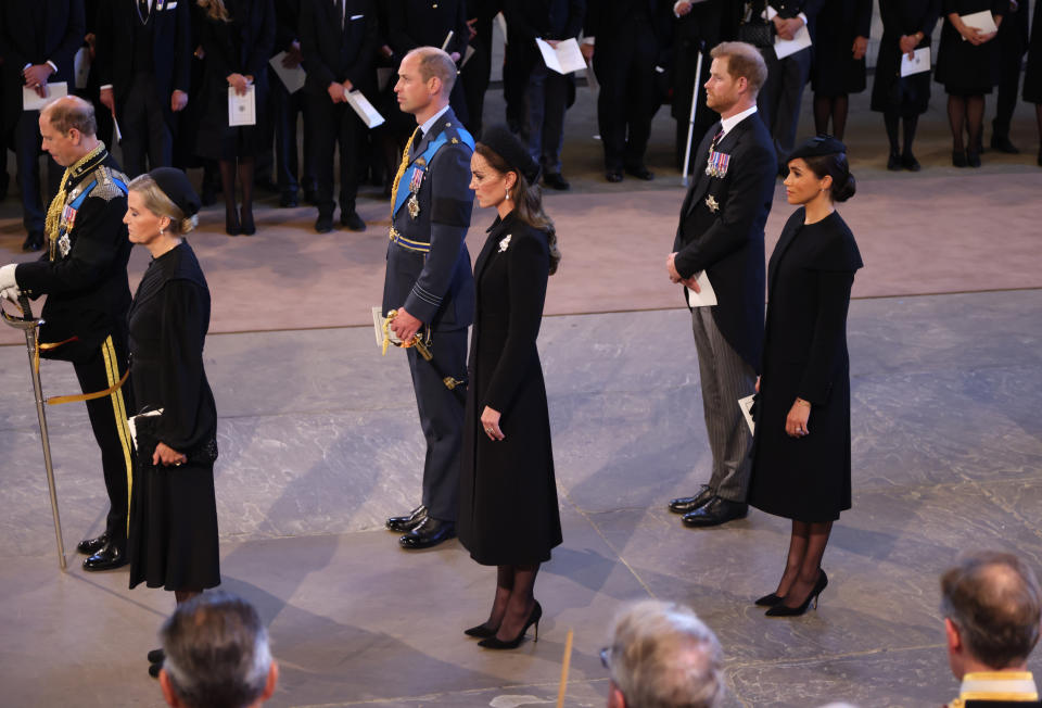 LONDON, ENGLAND - SEPTEMBER 14:  Prince Edward, Earl of Wessex and Sophie, Countess of Wessex, Prince William, Prince of Wales, Catherine, Princess of Wales, Prince Harry, Duke of Sussex, Meghan, Duchess of Sussex and Peter Phillips follow the coffin of Queen Elizabeth II into Westminster Hall on September 14, 2022 in London, United Kingdom. Queen Elizabeth II's coffin is taken in procession on a Gun Carriage of The King's Troop Royal Horse Artillery from Buckingham Palace to Westminster Hall where she will lay in state until the early morning of her funeral. Queen Elizabeth II died at Balmoral Castle in Scotland on September 8, 2022, and is succeeded by her eldest son, King Charles III. (Photo by Darren Fletcher - WPA Pool/Getty Images)