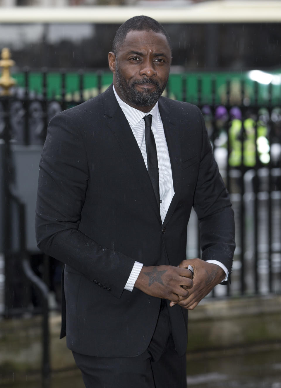 British actor Idris Elba who portrayed Nelson Mandela in a recent film arrives for the Nelson Mandela memorial service at Westminster Abbey in London Monday, March, 3, 2014. Mandela the former president of South Africa died in December 2013. (AP Photo/Alastair Grant)