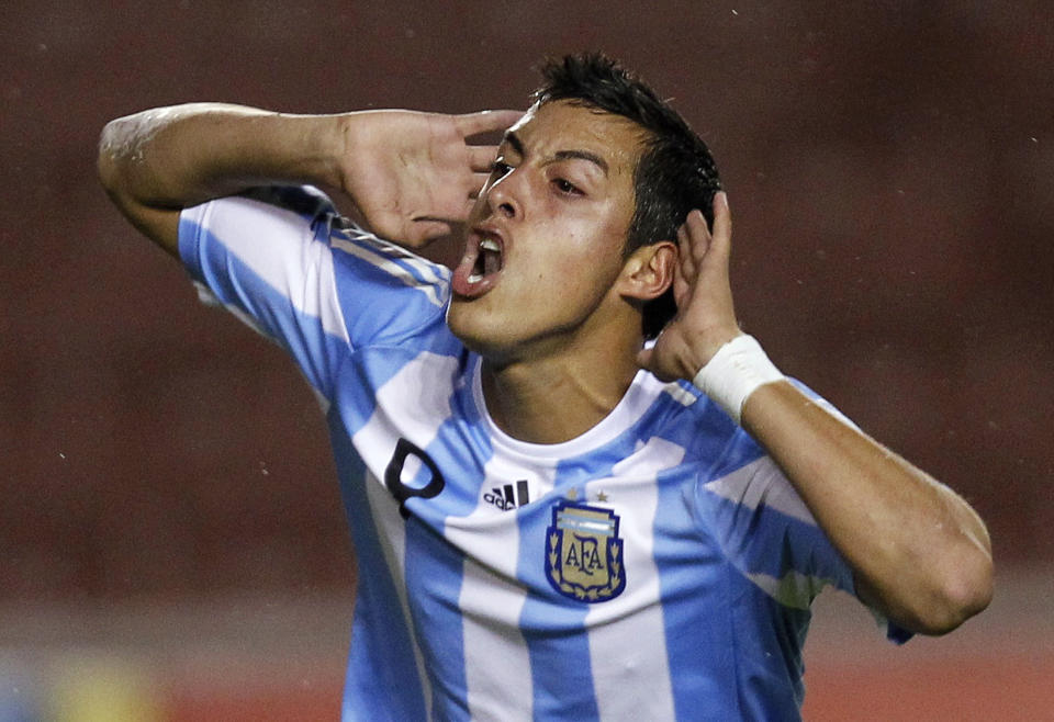 Argentina's Rogelio Funes Mori celebrates after he scored a penalty against Brazil in a Conmebol U-20 championship soccer match in Arequipa February 6, 2011.           REUTERS/Mariana Bazo (PERU - Tags: SPORT SOCCER)