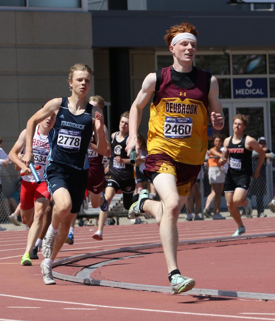 Deubrook Area's Landen Johnson competes in a Class B boys' relay during the 2023 South Dakota State Track and Field Championships in Sioux Falls.