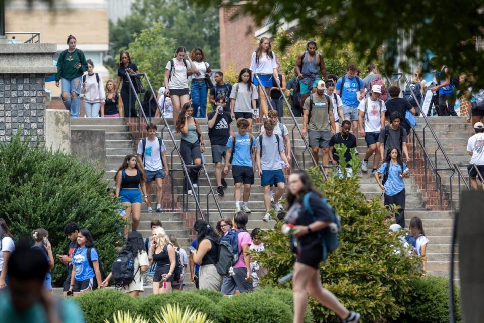 Students pour out of the University of North Carolina student union after a lock down was lifted just after 2:15 p.m. on Wednesday, September 13, 2023 in Chapel Hill, N.C. The lockdown began around 1 p.m. after a report an armed and dangerous person on campus.