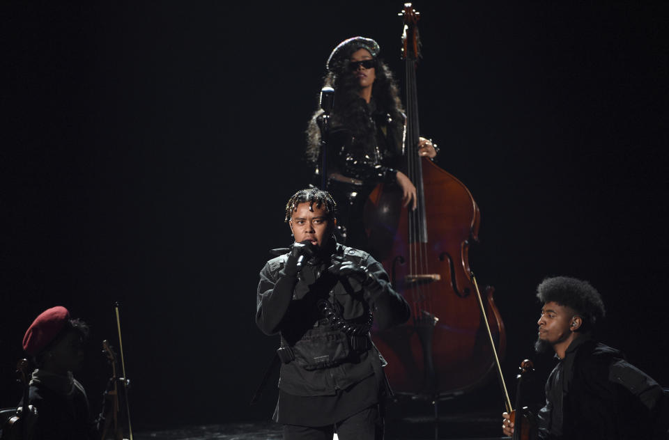 YBN Cordae, foreground, and H.E.R. perform "Lord Is Coming" at the BET Awards on Sunday, June 23, 2019, at the Microsoft Theater in Los Angeles. (Photo by Chris Pizzello/Invision/AP)