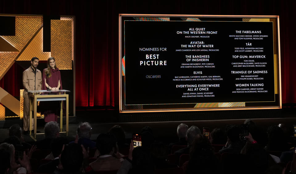 Riz Ahmed, left, and Allison Williams announce the Academy Awards nominations for best picture at the 95th Academy Awards nomination ceremony on Tuesday, Jan. 24, 2023, at the Academy Museum in Los Angeles. The 95th annual Academy Awards will take place on Sunday, March 12, 2023, at the Dolby Theatre in Los Angeles. (AP Photo/Jae C. Hong)