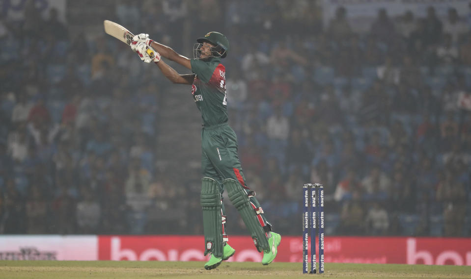 Bangladesh's Mohammad Naim plays a shot during the third Twenty20 international cricket match against India in Nagpur, India, Sunday, Nov. 10, 2019.(AP Photo/Rafiq Maqbool)