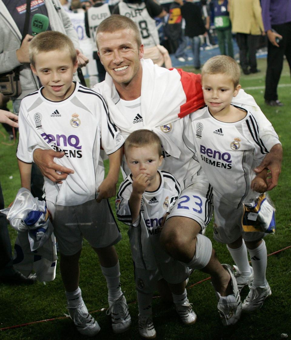 David with sons Brooklyn, Romeo and Cruz (Victor Fraile/Reuters)