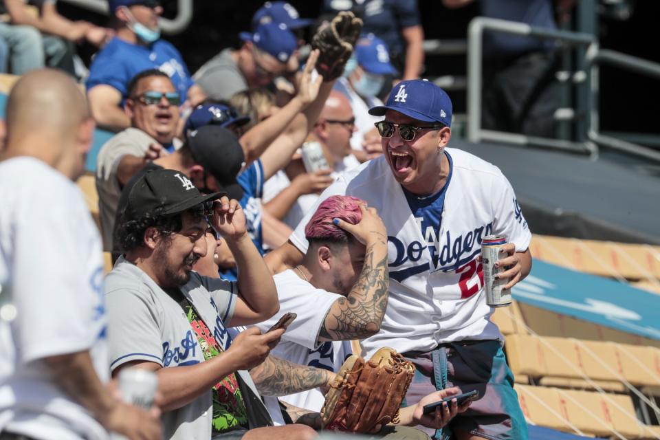 Los Angeles, CA, Friday, April 9, 2021 - Fans having fun in the left field pavilion seats late in the game.