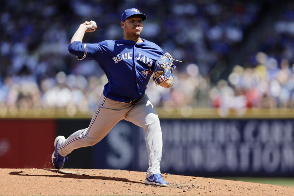 Toronto Blue Jays starting pitcher Yariel Rodríguez throws against the Seattle Mariners during the second inning in a baseball game, Saturday, July 6, 2024, in Seattle. (AP Photo/John Froschauer)