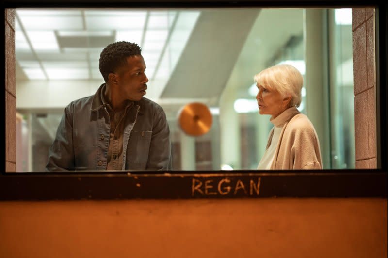 Chris MacNeil (Ellen Burstyn, R) shares her "Exorcist" experiences with Victor (Leslie Odom Jr.). Photo courtesy of Universal Pictures