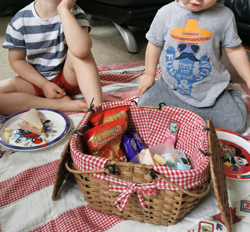 woman's picnic basket with her kids