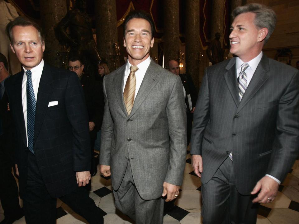 FILE - In this Feb. 17, 2005 file photo, then-California State Assemblyman Kevin McCarthy, right, walks with then-California Gov. Arnold Schwarzenegger, center, and Rep. David Dreier, R-Calif., on Capitol Hill in Washington. McCarthy, the majority leader who’s favored to become the next speaker of the House, has energetically nurtured GOP legislators in the House since he was elected to Congress nine years ago. (AP Photo/Haraz N. Ghanbari, File)