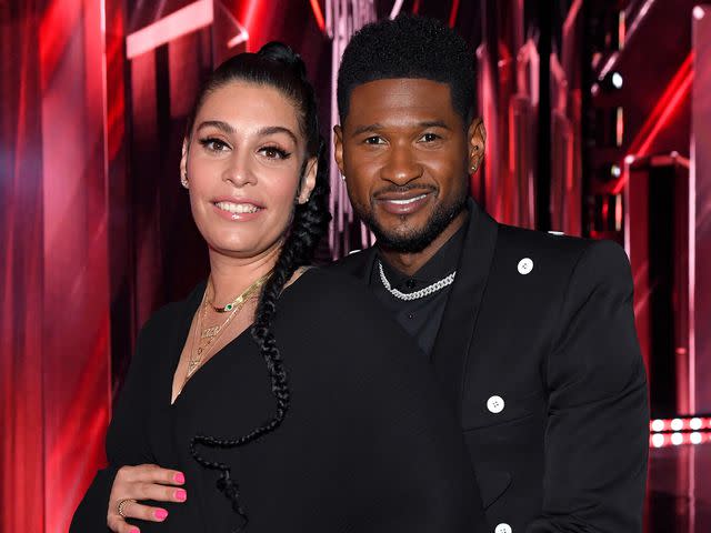 Kevin Mazur/Getty Usher and partner Jennifer Goicoechea attend the 2021 iHeartRadio Music Awards.