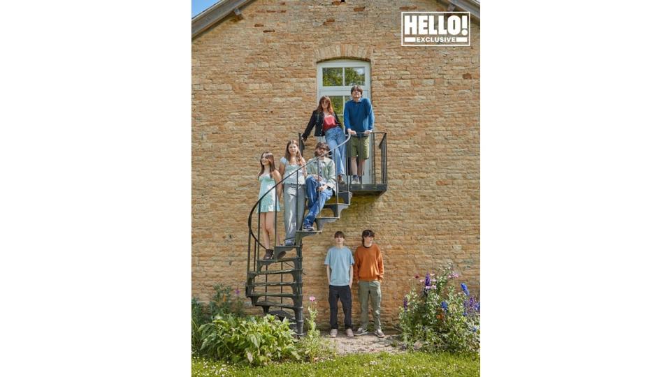 Blur star Alex James's family posing at farmhouse in Kingham, Oxfordshire 