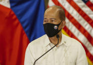 Philippines Defense Secretary Delfin Lorenzana holds a press conference with U.S. Defense Secretary Lloyd Austin (not in photo) after a bilateral meeting at Camp Aguinaldo military camp in Quezon City, Metro Manila, Philippines Friday, July 30, 2021. Austin is visiting Manila to hold talks with Philippine officials to boost defense ties and possibly discuss the The Visiting Forces Agreement between the US and Philippines. (Rolex dela Pena/Pool Photo via AP)