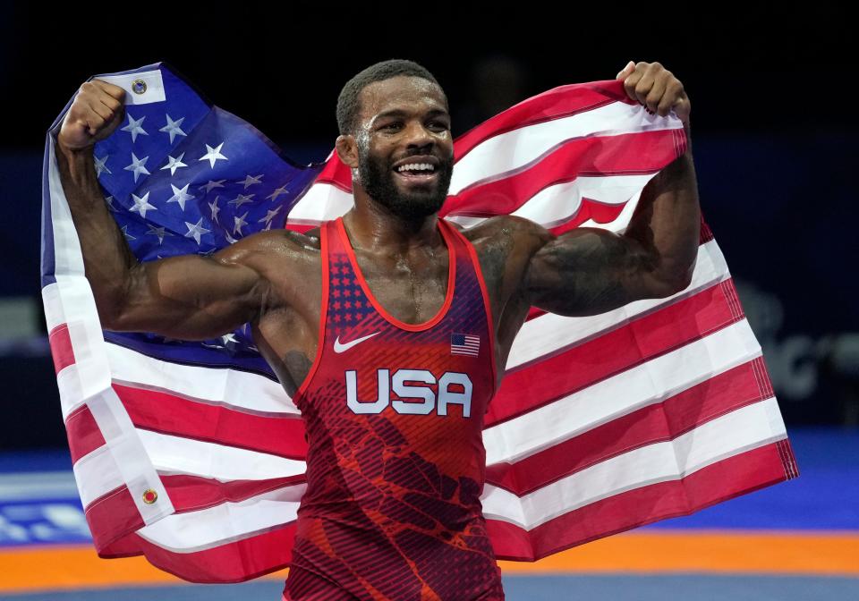 Jordan Burroughs of United States celebrates after his men's freestyle 79 kg wrestling final match during the Wrestling World Championships in Belgrade, Serbia.