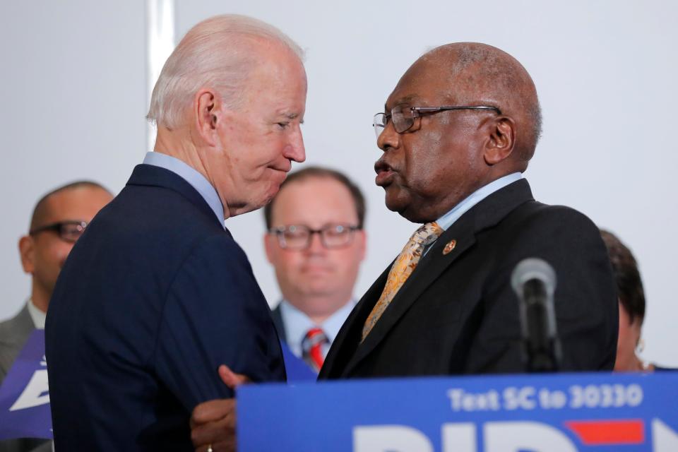 House Majority Whip, Rep. Jim Clyburn, D-S.C., greets Democratic presidential candidate and former Vice President Joe Biden, as he endorses him in North Charleston, S.C., Wednesday, Feb. 26, 2020. (AP Photo/Gerald Herbert)