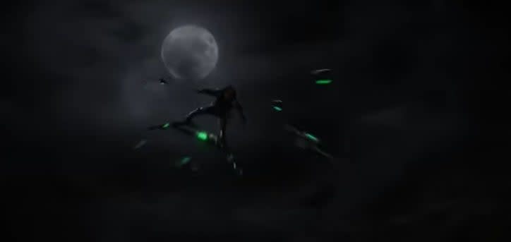 The Green Goblin firing sharp projectiles from his glider in the night sky in "Spider-Man: No Way Home"