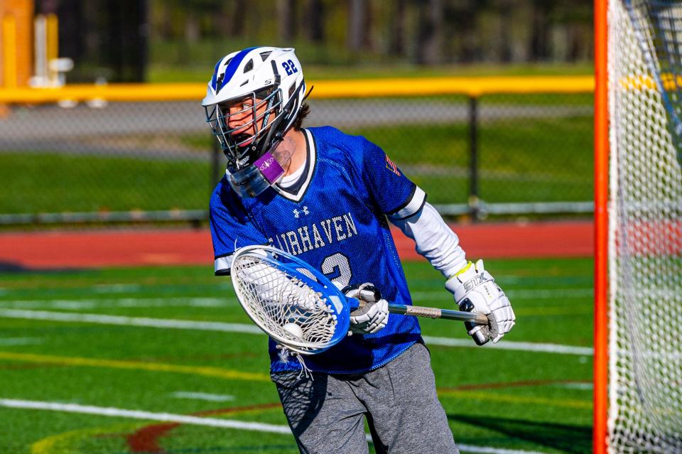 Fairhaven's Shea Cripps looks up the field for an outlet.