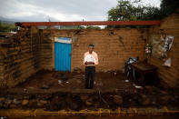 <p>Prudencio Gutierrez, 66, a farm worker, poses for a portrait in front of his house after an earthquake in San Francisco Xochiteopan, Mexico, September 27, 2017. Gutierrez’s house was badly damaged, but he was able to rescue his bed and some clothing. “The most valuable thing that I recovered was my hat,” he said. “The authorities said they were going to help us build a house, but I do not know if it’s true.” (Photo: Edgard Garrido/Reuters) </p>
