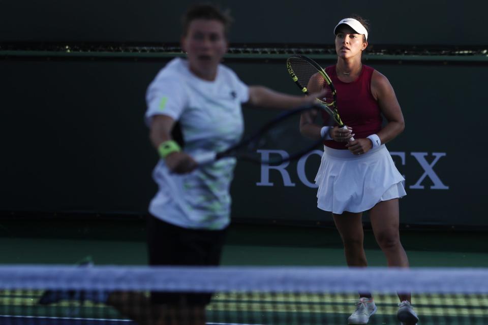 Desirae Krawczyk watches Demi Schuurs during their BNP Paribas Open doubles win in Indian Wells, Calif., on March 9, 2023. 
