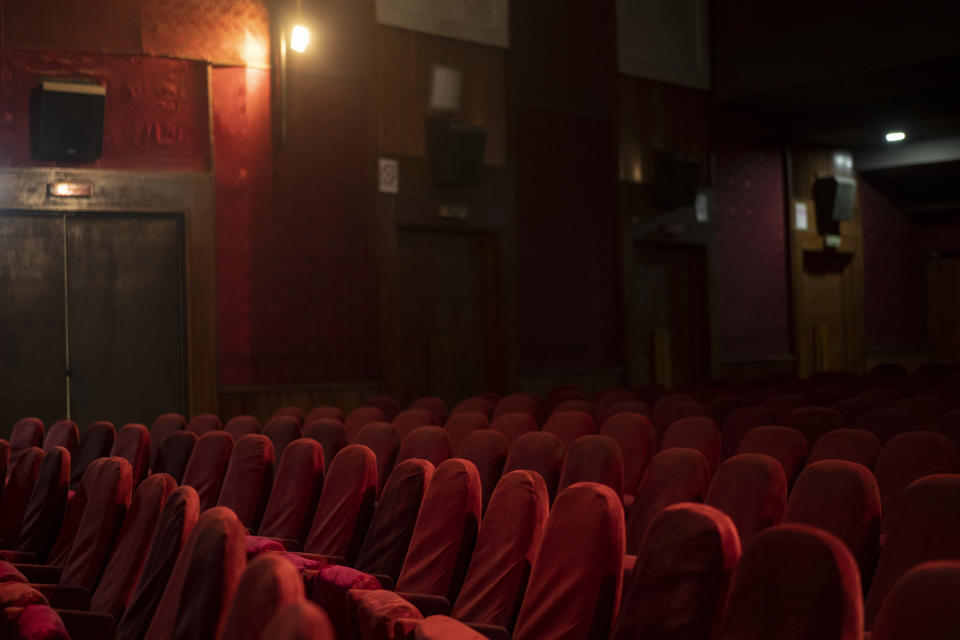 Empty seats are seen inside the Ariana Cinema in Kabul, Afghanistan on Thursday, Nov. 4, 2021. After seizing power three months ago, the Taliban ordered cinemas to stop operating. (AP Photo/Bram Janssen)