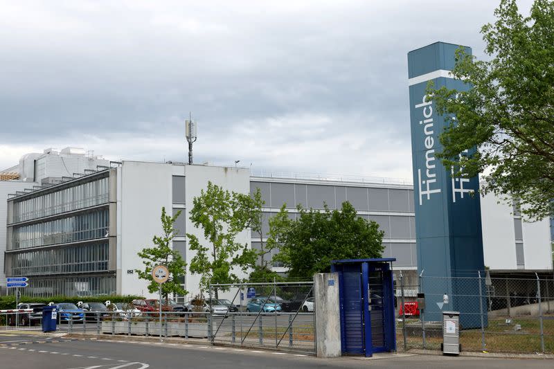 A logo is pictured in front of flavour and fragrance maker Firmenich production site, in Meyrin