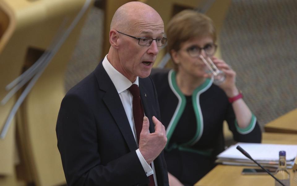 , John Swinney, the Scottish education minister,  on Tuesday announced a major U-turn after close to 125,000 students had their predicted results downgraded by a moderation process.  - Getty Images 