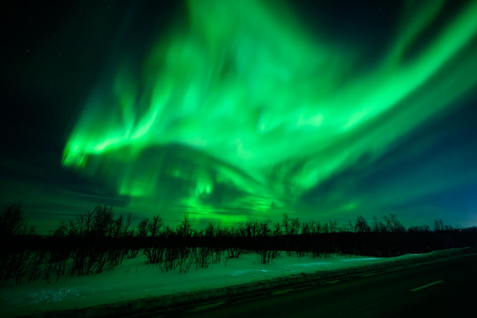 KIRUNA, SWEDEN - MARCH 7: The Aurora Borealis, commonly known as the Northern Lights, are seen in the sky above Kiruna on March 7, 2024 in Kiruna, Sweden. The area is widely regarded as one of the best places in the world to see the phenomenon, which occurs when energized particles from the sun hit the Earth's upper atmosphere. (Photo by Leon Neal/Getty Images)