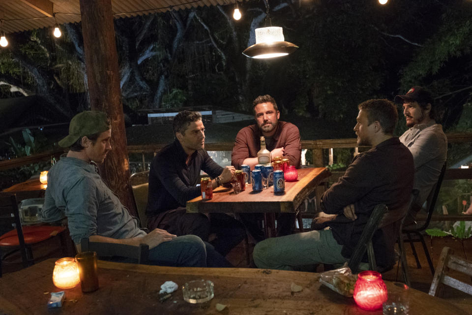 This image released by Netflix shows Garrett Hedlund, from left, Oscar Isaac, Ben Affleck, Charlie Hunnam, and Pedro Pascal in a scene from the film, "Triple Frontier." (Melinda Sue Gordon/Netflix via AP)