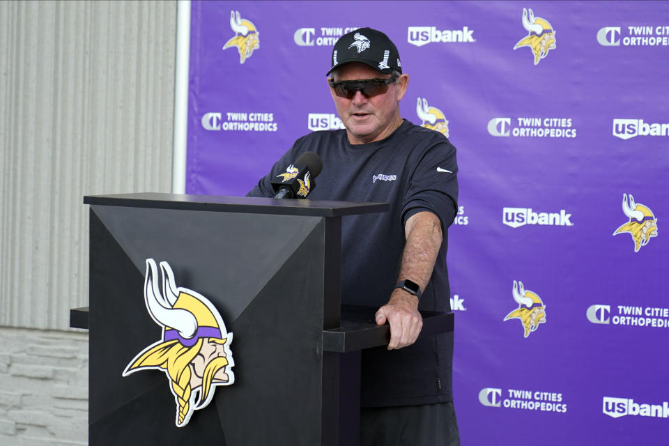 Minnesota Vikings coach Mike Zimmer speaks to reporters during the NFL football team's training camp Saturday, July 31, 2021, in Eagan, Minn. (AP Photo/Jim Mone)