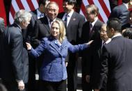 BEIJING, CHINA - MAY 3: U.S. Secretary of State Hillary Clinton (2nd L) introduces an official to China's State Councilor Dai Bingguo (2nd R) as they attend a group photo shooting after the opening ceremony of U.S.-China Strategic and Economic Dialogue at Diaoyutai State Guesthouse on May 3, 2012 in Beijing, China. High-level representatives from both countries will meet to discuss a wide range of issues from economics to security. (Photo by Jason Lee-Pool/Getty Images)