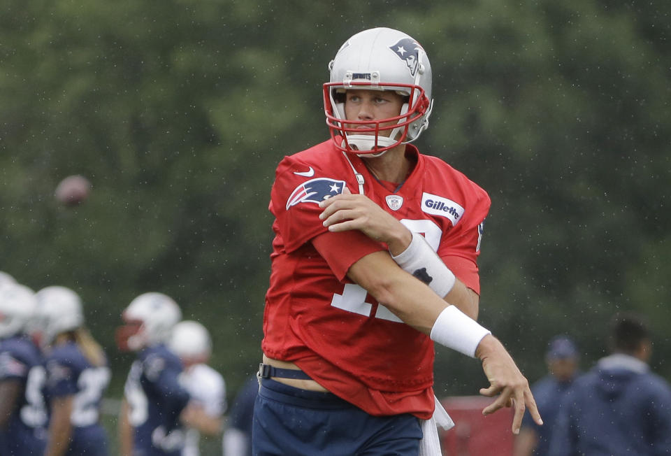 New England Patriots quarterback Tom Brady has a knack for avoiding big hits. (AP Photo/Steven Senne)