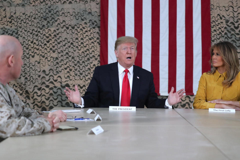 President Trump, traveling with first lady Melania Trump, meets political and military leaders at Al Asad Air Base, Iraq, on Dec. 26, 2018. (Photo: Jonathan Ernst/Reuters)