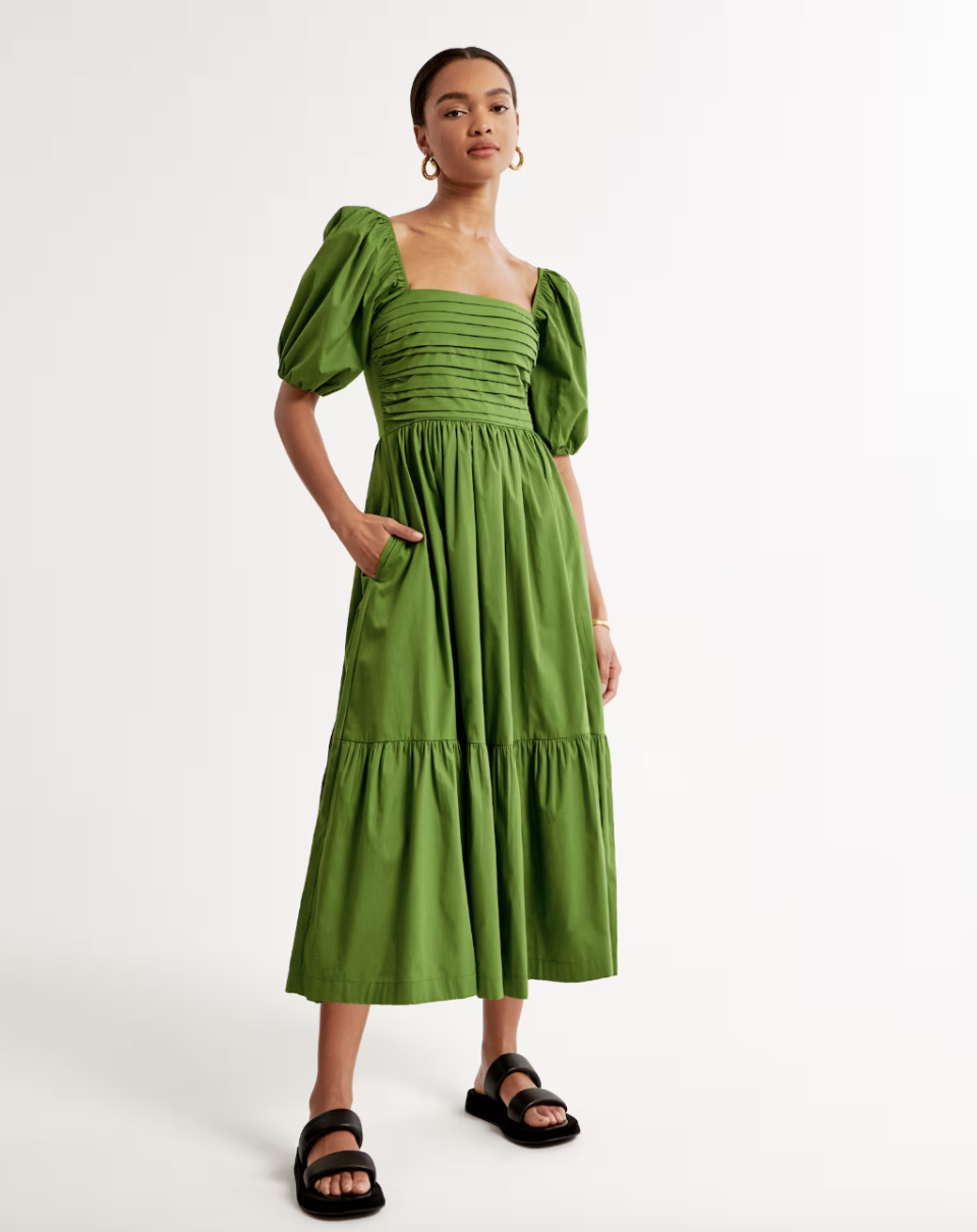 model wearing green short sleeve Emerson Poplin Puff Sleeve Midi Dress (photo via Abercrombie)