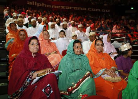 Members of the Australian-Indian community listen to Prime Minister Narendra Modi as he speaks during a reception at the Allphones Arena located at Sydney Olympic Park in western Sydney November 17, 2014. REUTERS/Rick Stevens