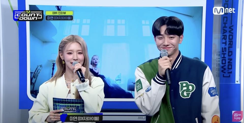 Woman and man mc'ing music show