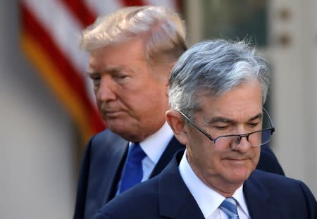 FILE PHOTO: U.S. President Donald Trump looks on as Jerome Powell, his nominee to become chairman of the U.S. Federal Reserve moves to the podium at the White House in Washington