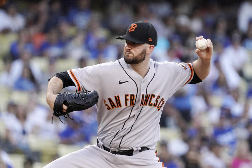 San Francisco Giants starting pitcher Alex Wood throws to the plate during the first inning of a baseball game against the Los Angeles Dodgers Tuesday, July 20, 2021, in Los Angeles. (AP Photo/Mark J. Terrill)