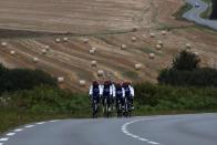 The Wider Image: Haiti's cyclists brave protests and poor roads in race for gold