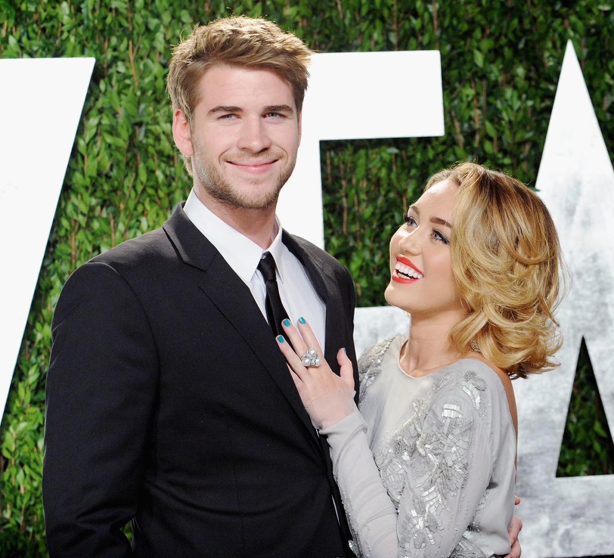 west hollywood, ca february 26 actor liam hemsworth and actresssinger miley cyrus arrive at the 2012 vanity fair oscar party at sunset tower on february 26, 2012 in west hollywood, california photo by jon kopalofffilmmagic