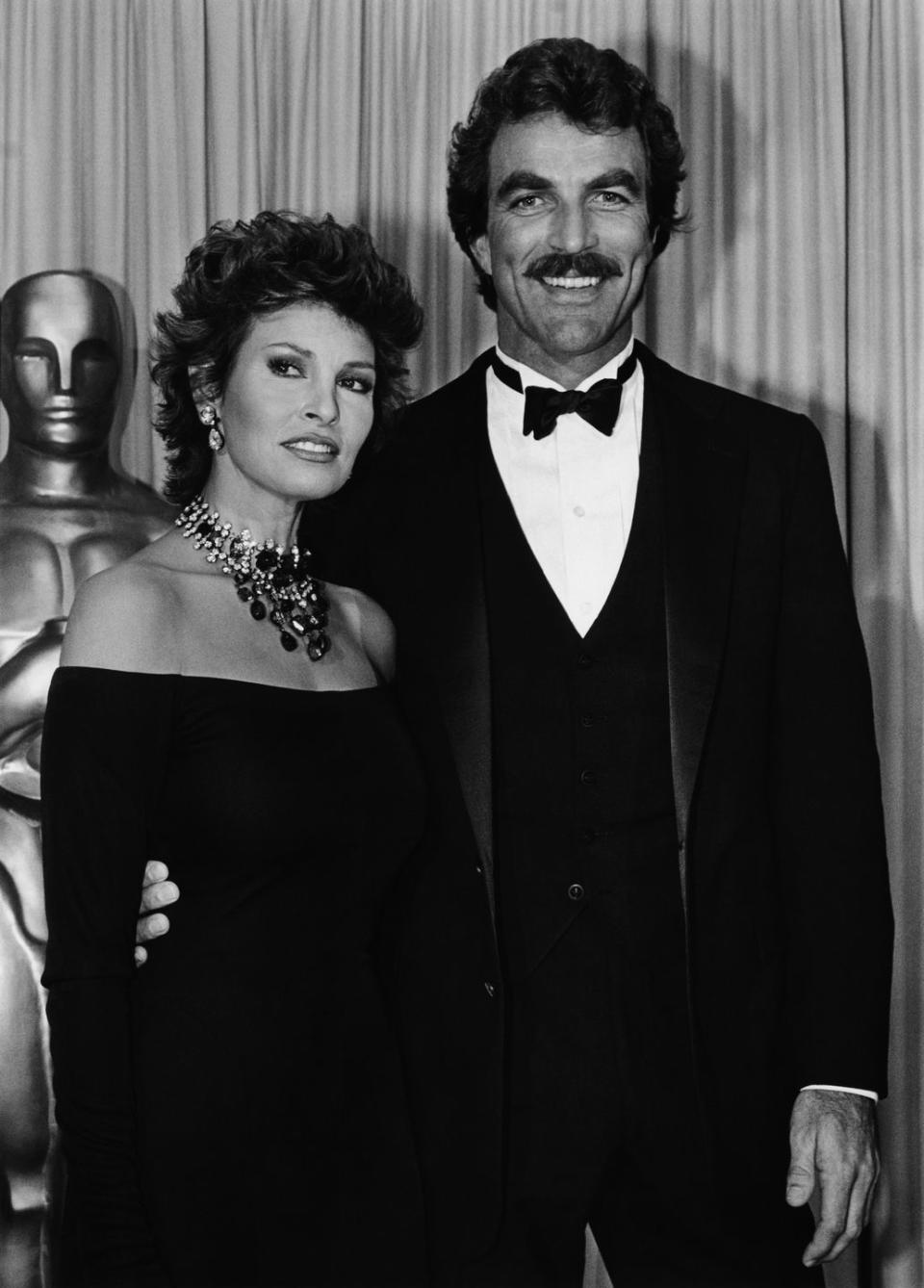 los angeles, ca 1983 emmy award winning actor, tom selleck, poses with raquel welch backstage at the 1983 los angeles, california, academy awards presentation selleck starred in the hit tv show magnum pi photo by george rosegetty images