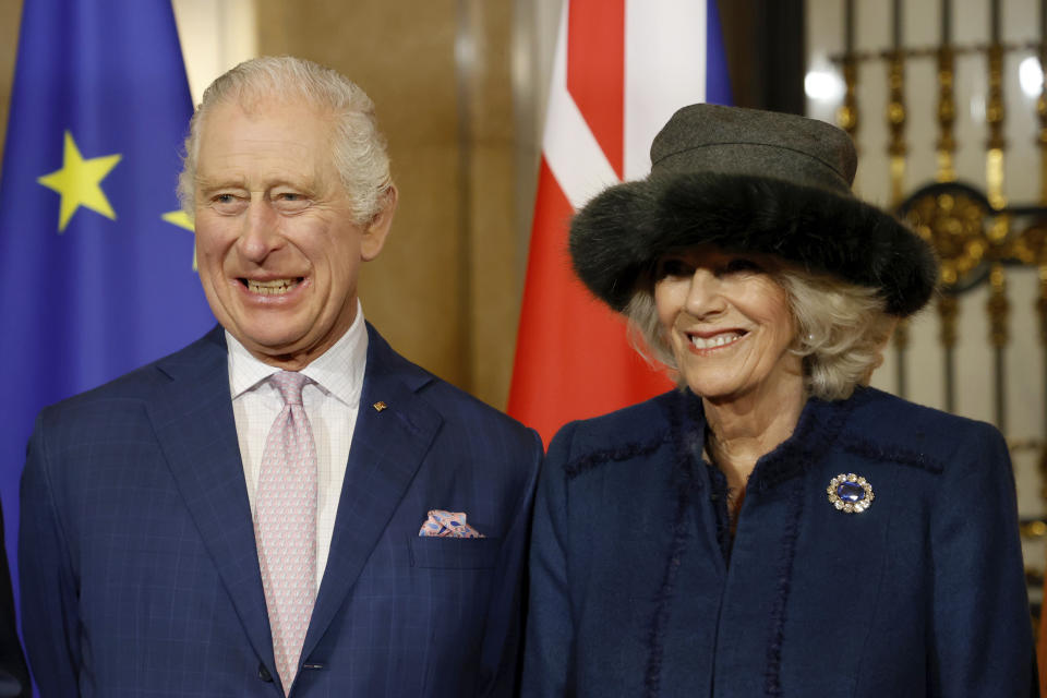 King Charles III of Great Britain and Royal Consort Camilla stand at Hamburg City Hall, Germany, Friday, March 31, 2023. ( Georg Wendt/dpa via AP)