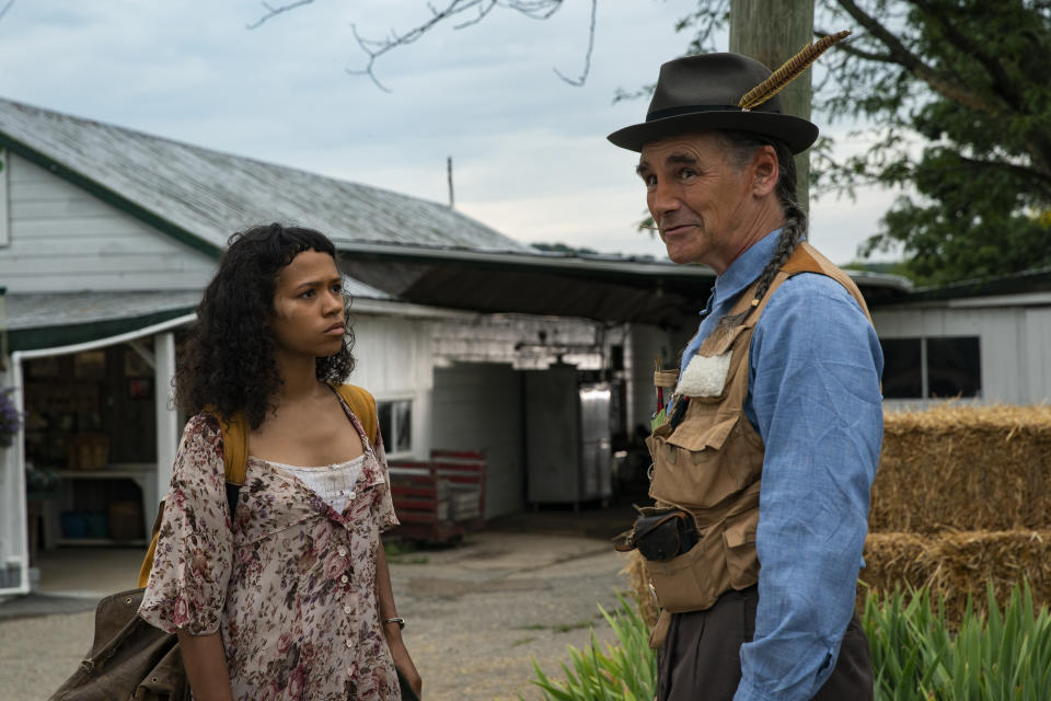 This image released by MGM Pictures shows Taylor Russell, left, and Mark Rylance in a scene from "Bones and All." (Yannis Drakoulidis/Metro Goldwyn Mayer Pictures via AP)