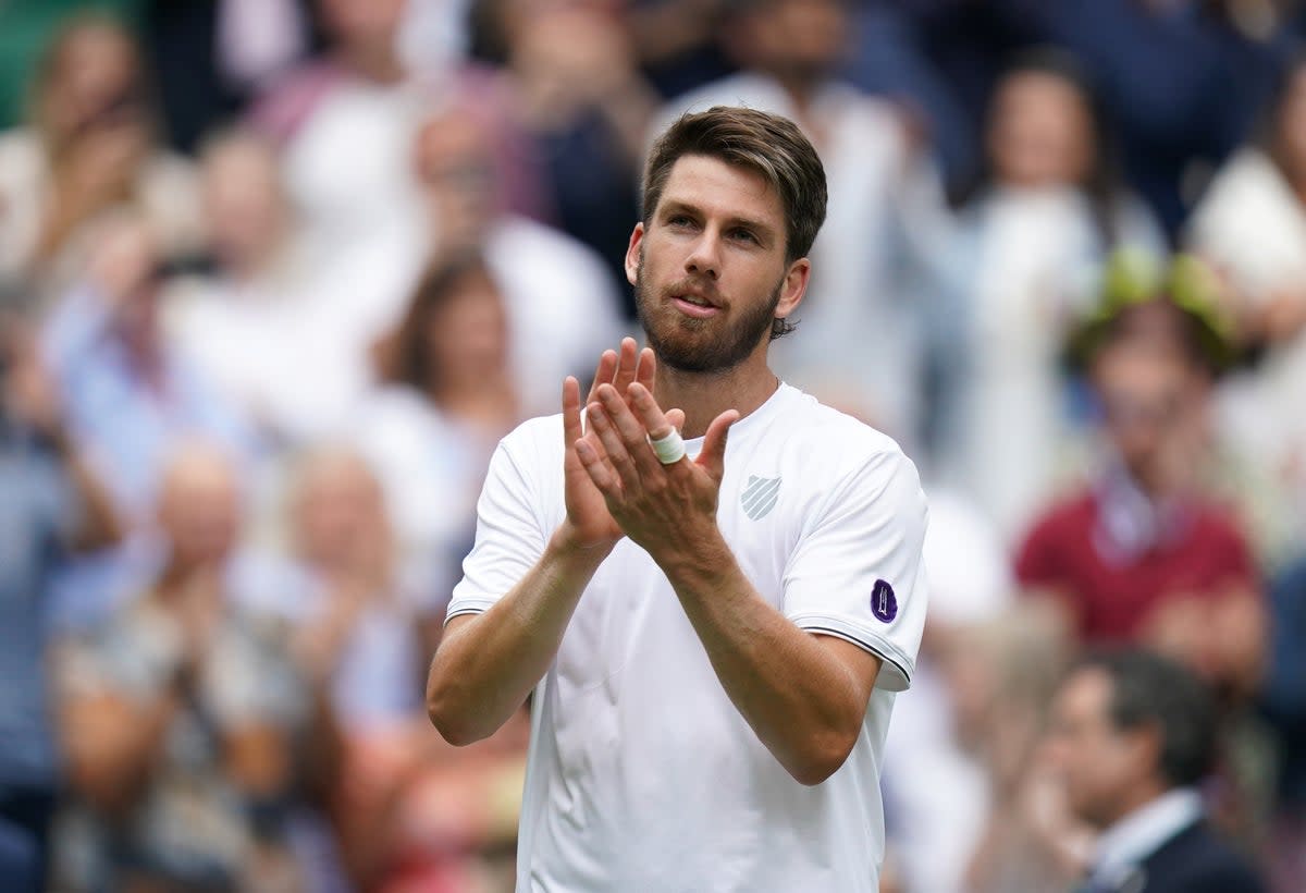 Cameron Norrie applauds the fans after winning his third round match against Steve Johnson (Adam Davy/PA) (PA Wire)