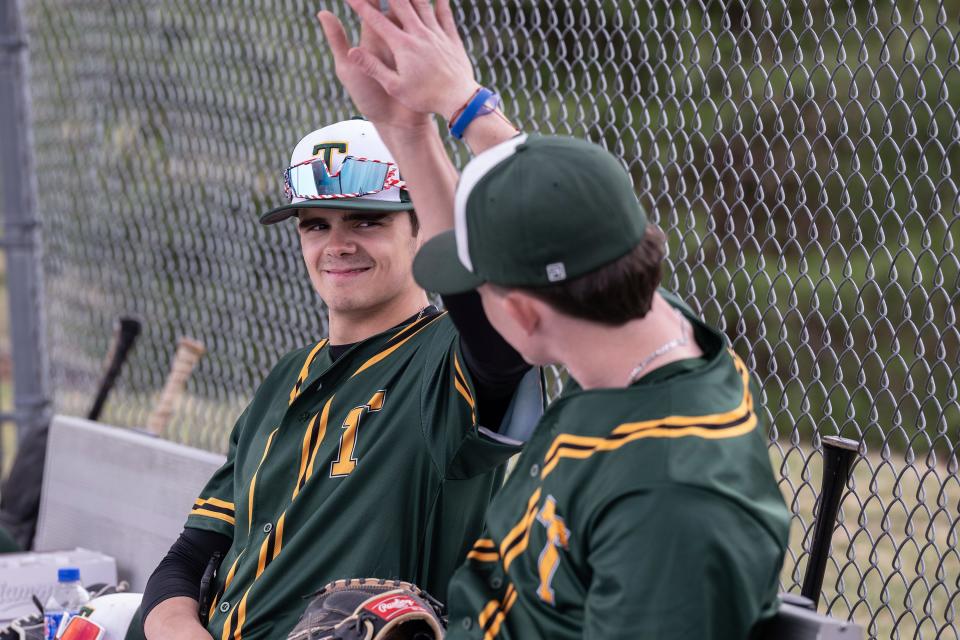 Tantasqua's Jack Alexander, left, and Miles Blake high-five during Wednesday's game against Millbury.