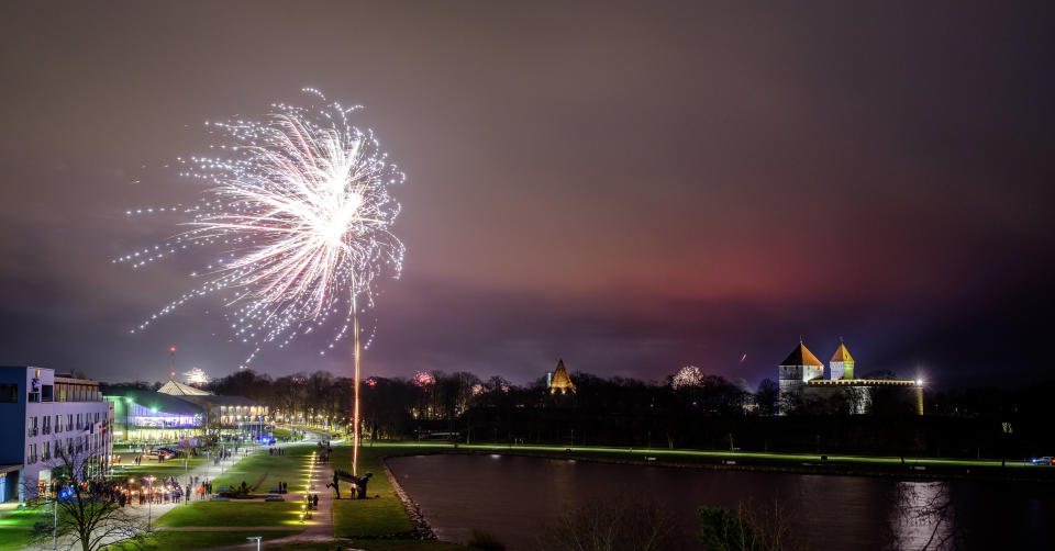 Fireworks are seen near Kuressaare Castle during New Year's celebrations. (Photo: SOPA Images via Getty Images)